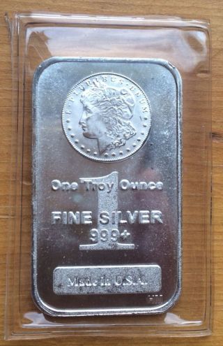 1 One Ounce Troy.  999 Pure Silver Bullion 1 Oz Morgan Silver Dollar Design Bar photo