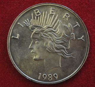 1989 1 One Oz.  999 Fine Silver Trade Unit Peace Dollar Style Round photo