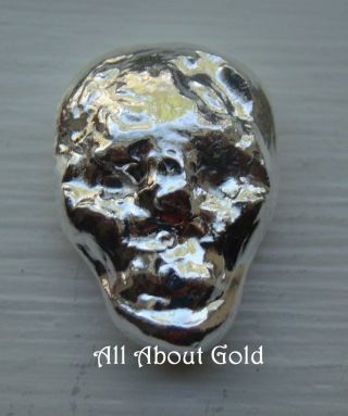 Solid Silver Bar 1/2 (half) Oz Atlantis Alien Skull Hand Poured Loaf.  999 photo