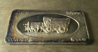 Prarie Schooner - Covered Wagon - 1 Ounce.  999 Silver Bar - Nicely Toned photo