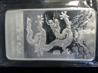 2012 Year Of The Dragon 10 Oz Silver Bar.  999 Fine photo