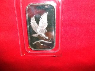 One Troy Ounce.  999 Fine Silver Bar,  Silvertowne Flying Eagle,  Uncirculated photo