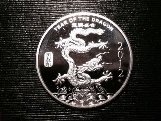 2012 1oz.  999 Fine Silver Year Of The Dragon Bullion Round Proof Coin photo