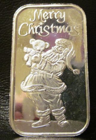 1995 Merry Christmas Santa Holding Teddy Bear 1oz.  999 Fine Silver photo
