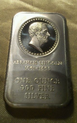 Abraham Lincoln 1 Ounce.  999 Silver Bar - photo