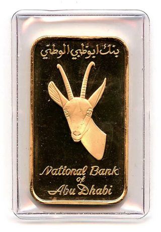 Credit Suisse 1 Oz Fine Gold National Bank Of Abu Dhabi Plastic photo