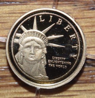 14kt Gold Mini Round - Statue Of Liberty Commemorative Coin - Solid 14kt Gold photo