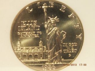 1986,  Statue Of Liberty Commem.  Silver Dollar And Clad Half Dollar photo