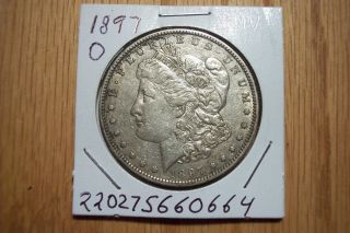 1897 O Morgan Silver Dollar With Light Blue Toning On Obverse & Reverse photo
