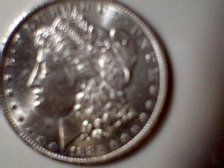 1885 - O $1 Morgan Silver Dollar Au/bu photo
