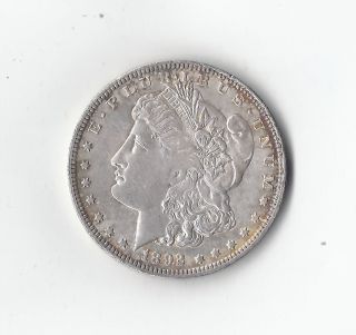 1892 O Morgan Silver Dollar A.  U - Unc. photo