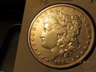 1884 - P Morgan Silver Dollar Xf Looks Great photo