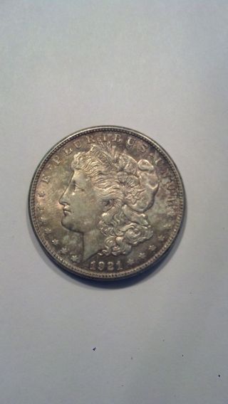 1921 - S U.  S.  Morgan Silver Dollar + Toning photo