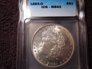 1884 - O Morgan Silver Dollar Icg Ms63 Priced Below Listed Value. photo
