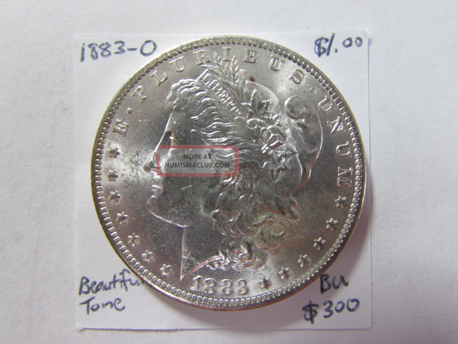 1883 O 1 Silver Dollar Toned Crescent Reverse