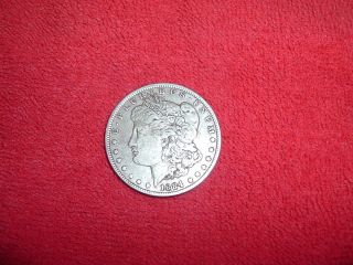 1884 - 0 Morgan Silver Dollar photo