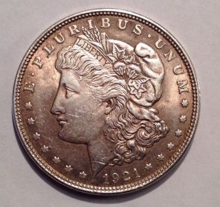 1921 Morgan Silver Dollar,  Au - Bu,  Rose Toning photo