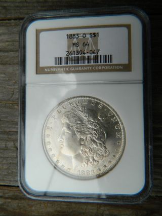 1883 O Morgan Silver Dollar With Toning On Back Ngc Ms64 Detail photo