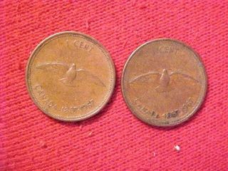 Two 1867 - 1967 Canada Centennial Commemorative One Cent photo