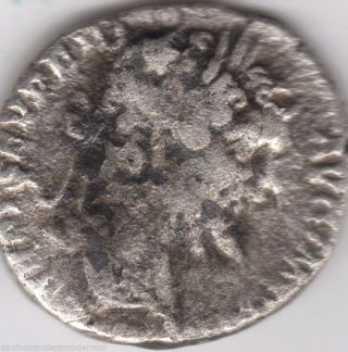 Silver Ar Denarius Coin For Septimius Severus With Genius On The Reverse Side. photo