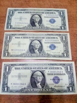 Silver Certificate Blue Seal One Dollar Bill 1957 (2) And 1935 (1) photo
