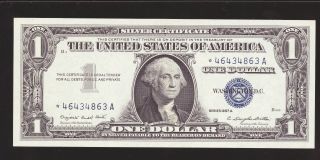 1957 - A Star $1 Silver Certificate Uncirculated High Retail @ $18.  00 photo