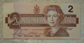 1986 Bank Of Canada Bc - 55c Two 2$ Dollars Unc Bonin - Thiessen Cbi 6191945 photo