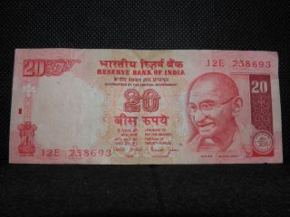 20 Rupees,  Reserve Bank Of India,  Signs Of Wear But No Tear,  Year Unknown. photo