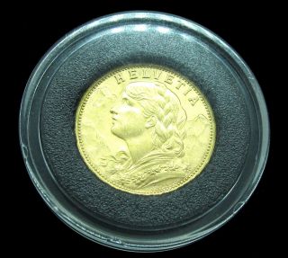 Swiss Helvetia - L1935 B - 20 Franc Gold Coin.  1867 Troy Oz.  Gold Uncirculated photo