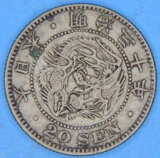 1897 Japan 20 Sen Silver Dragon Coin photo