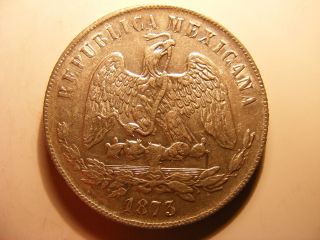 Mexico Peso,  1873 - Go S,  Radiant Cap Above Scales,  Au, photo