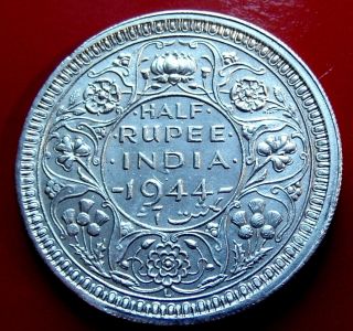 Rare 1944 Silver British India Half 1/2 Rupee.  Surfaces photo