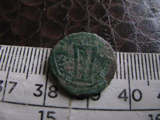 Unusual Little Ancient Roman Coin,  Unresearched,  Snake/serpent Around Tripod Rev,  B photo