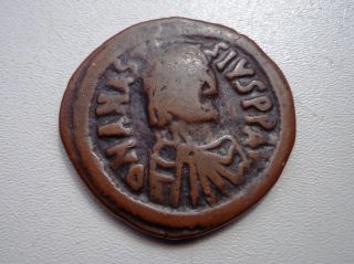 Byzantine Coin Of Emperor Anastasius I.  Ae Follis.  Constantinople. photo
