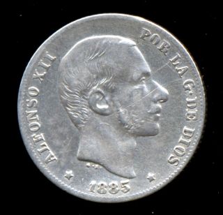 453 - Indalo - Spain.  Philippines.  Silver 20 Centavos 1885 photo