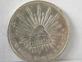 Un Peso 1903 Zacatecas.  9000 Silver photo