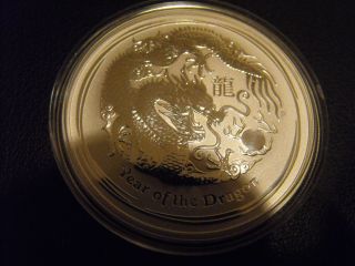 2012.  Year Of The Dragon Silver 1 Oz Coin.  Perth Capsule.  Bu photo