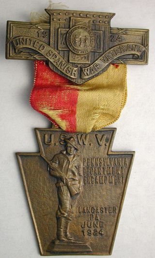 United Spanish War Veterans 1924 Encampment Badge With Ribbon photo