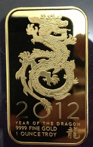 1 Oz 2012 Year Of The Dragon 100mills Pure.  999 24k Gold Bullion Bar Rare photo