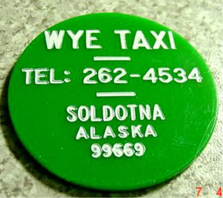 Alaska Transportation Token - Soldotna - Wye Taxi 1974 photo