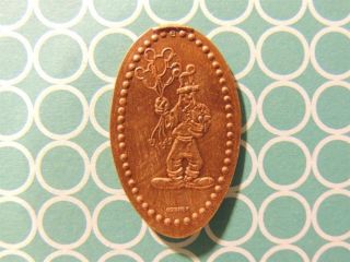 Elongated Penny Disney - Mk0082c - Goofy Wearing Mickey Hat And Holding Balloons photo