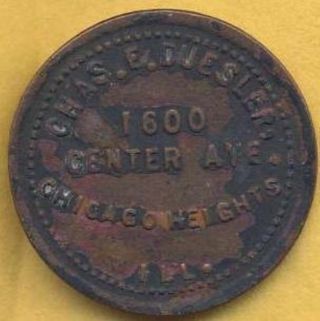 Vintage Chas.  E,  Duesler,  Chicago Heights,  Illinois 5 Cents In Trade Token. photo