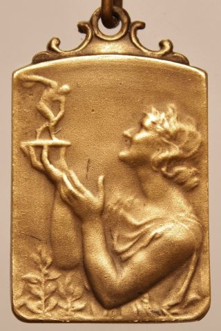 Antique Bronze Art Medal The Award photo