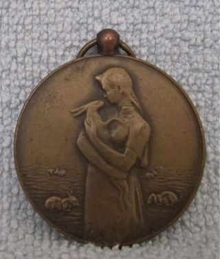 Rare Antique Dutch Rabbit Medal Bunnies photo