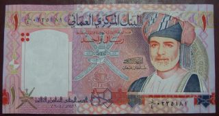 Oman 1 Rial Unc.  2005 photo