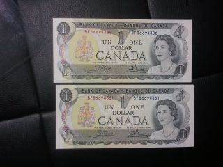 1973 Canadian One Dollar Bills.  2 Uncirculated.  Crisp And photo