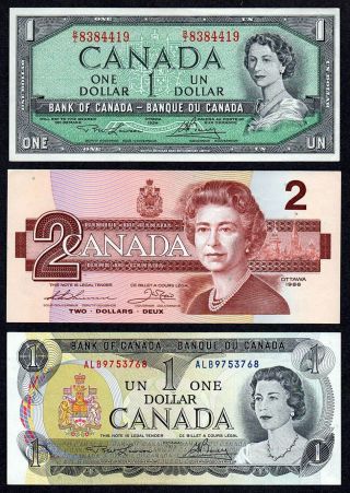 1954 $1.  00,  1986 $2.  00,  1973 $1.  00 = Canada Dollars Old Paper Money photo