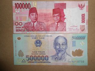 One Each 2013 Indonesia 100000 Rupiah & 2013 Vietnam 500000 Dong Circulated photo