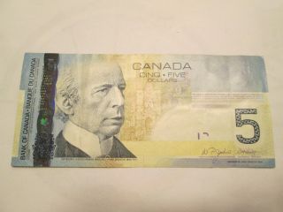 Canada $5 - 2006 Paper Bill. photo