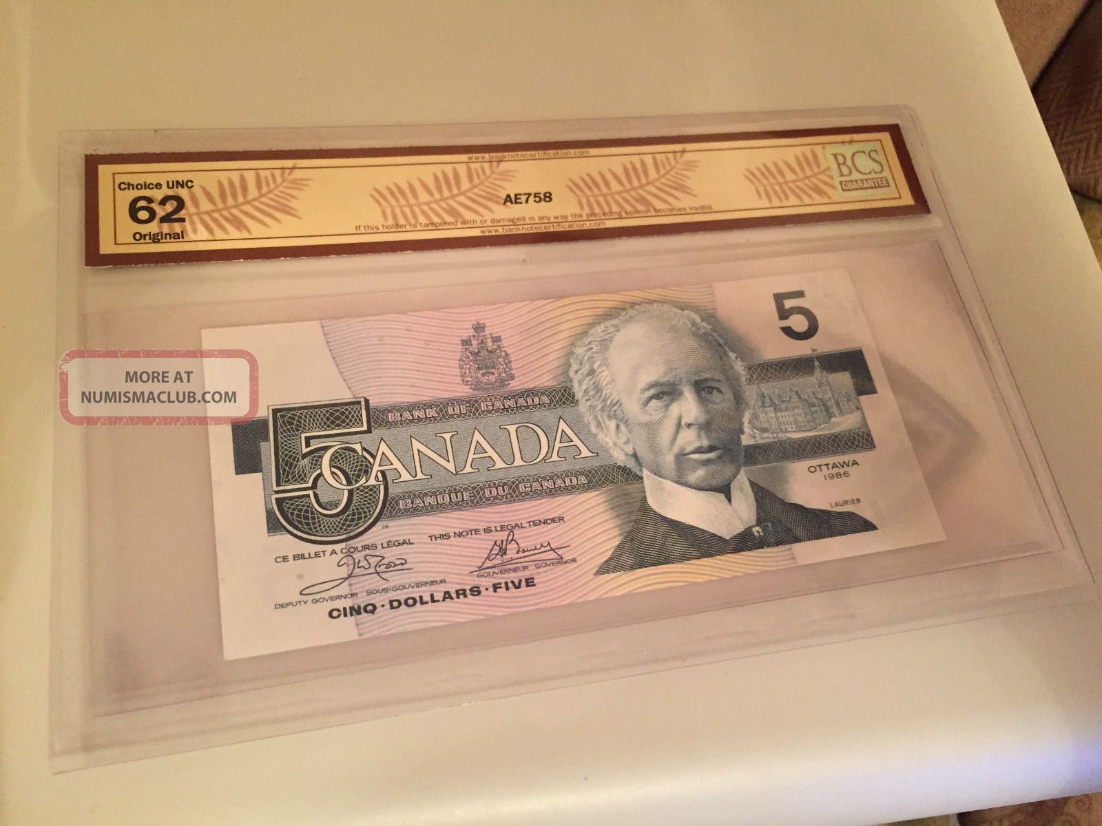 1986-canada-5-dollar-low-serial-number-graded